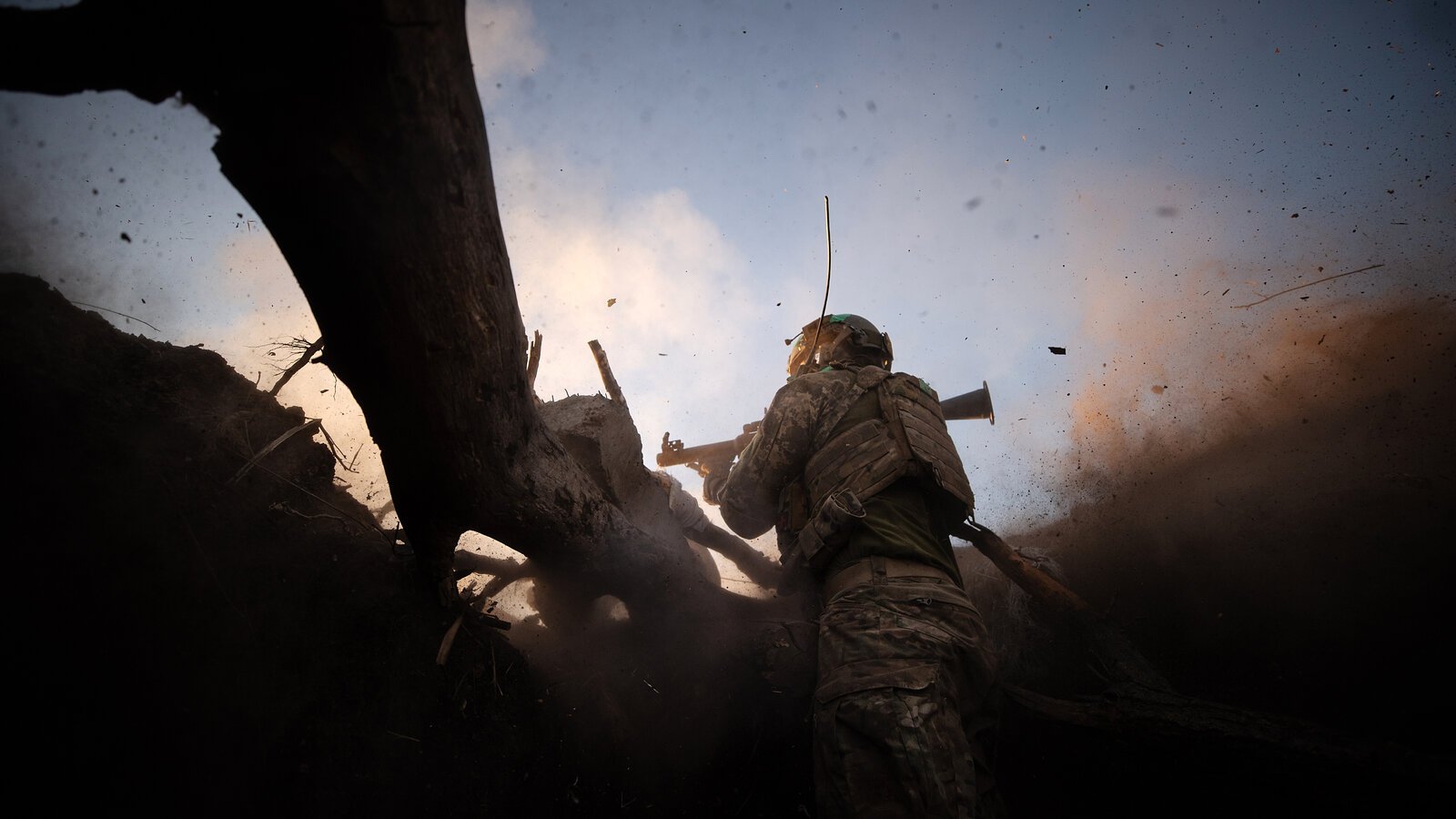 Ukrainian soldiers operating a drone intercept system in a snow-covered trench at night, eastern Ukraine, March 2026