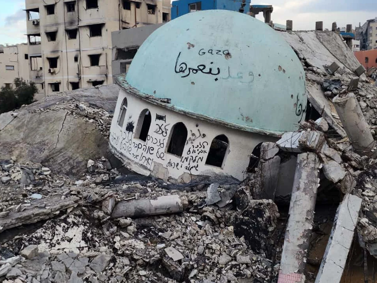 Emergency workers searching through collapsed apartment buildings in Gaza City at dawn, March 2026